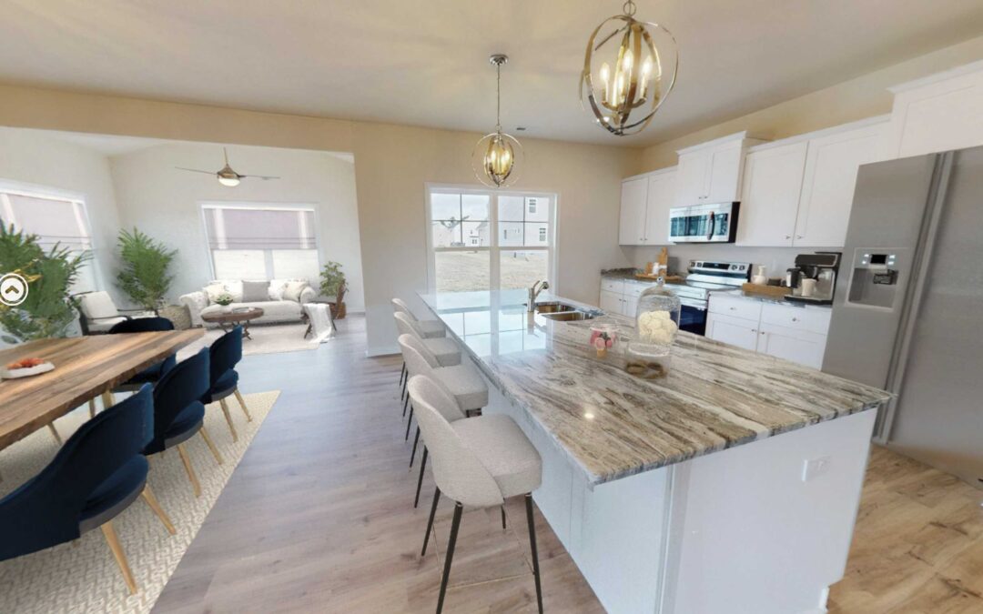 furnished kitchen and dining room in the Juniper by Boyd Homes.